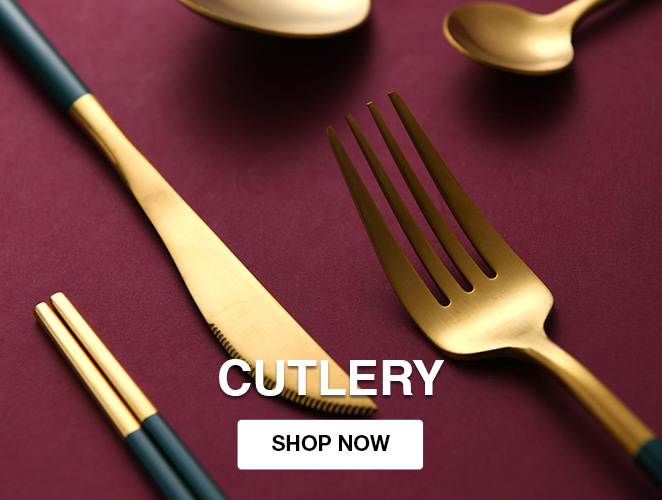Gold Cutlery on a red tablecloth
